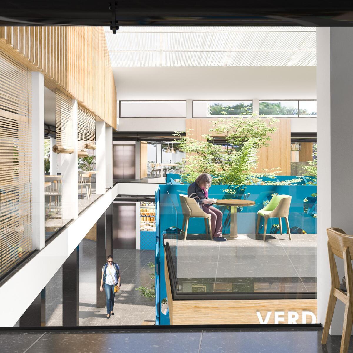 Interior del mercado. Espacios luminosos y funcionales para el comercio de proximidad.